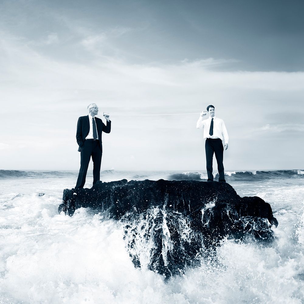 Two Business Men Talking Tin Phone Ocean Concept