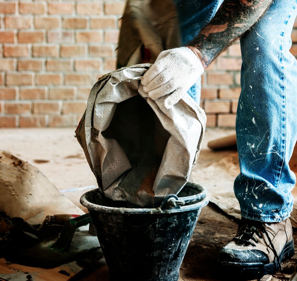 Handyman prepare cement use for construction