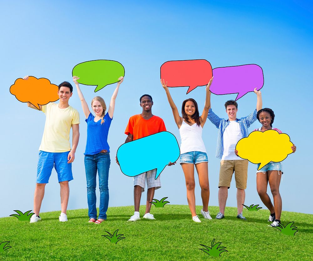 Group of People Holding Colorful Speech Bubbles Outdoors