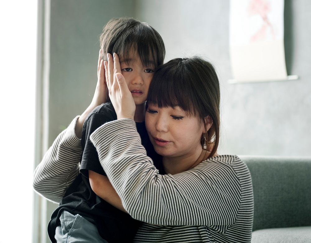 Japanese mother comforting her daughter