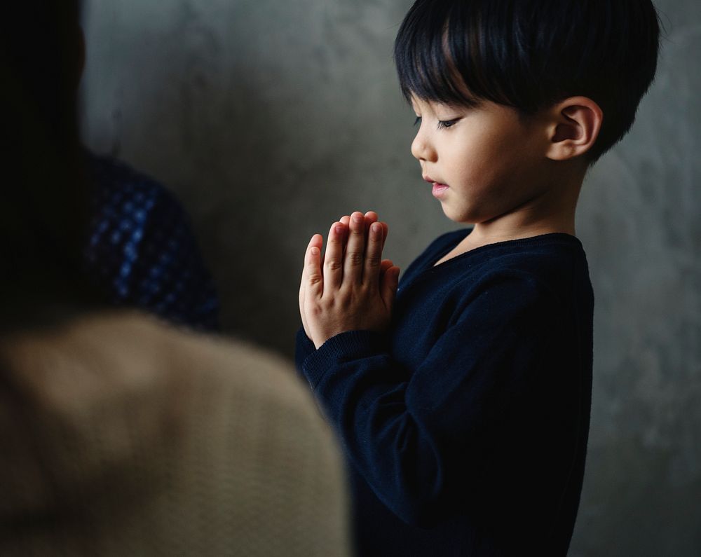 Japanese boy praying