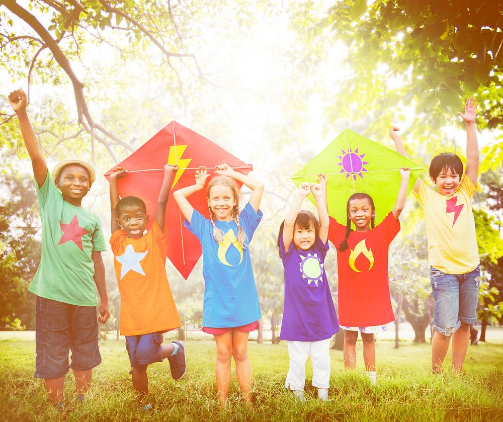 Children Outdoors Playing Cheerful Together Concept