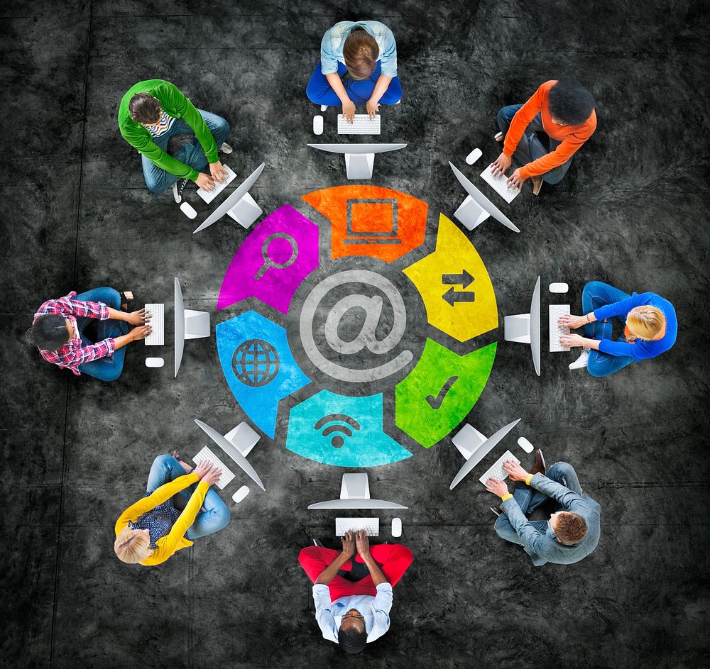 People in a Circle Using Computer with Email Concept
