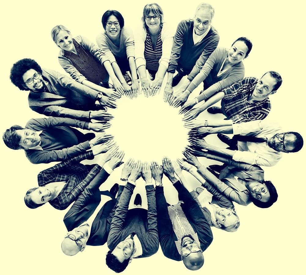 Multi-ethnic Diverse Group of People In Circle Concept