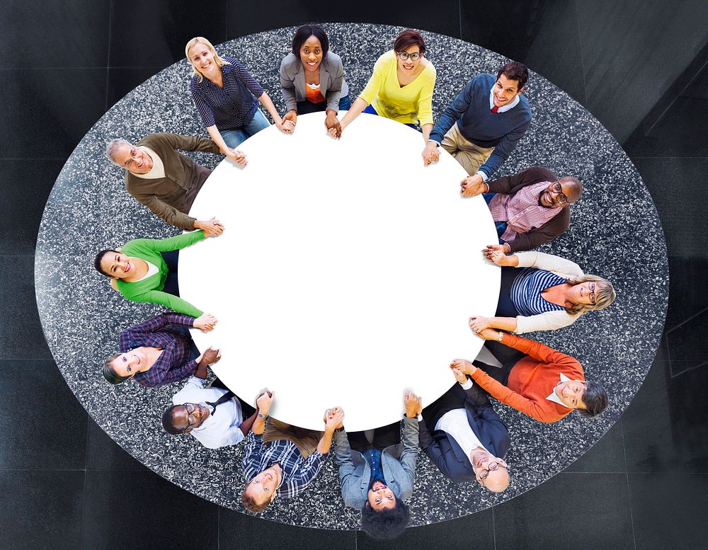 Aerial View of Multiethnic People Around the Table