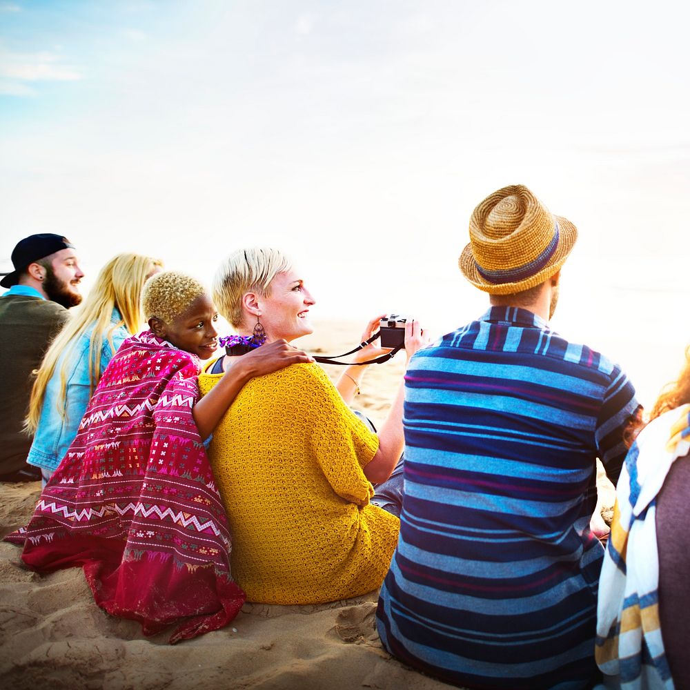 Group Of People Sitting On the Beach Concept