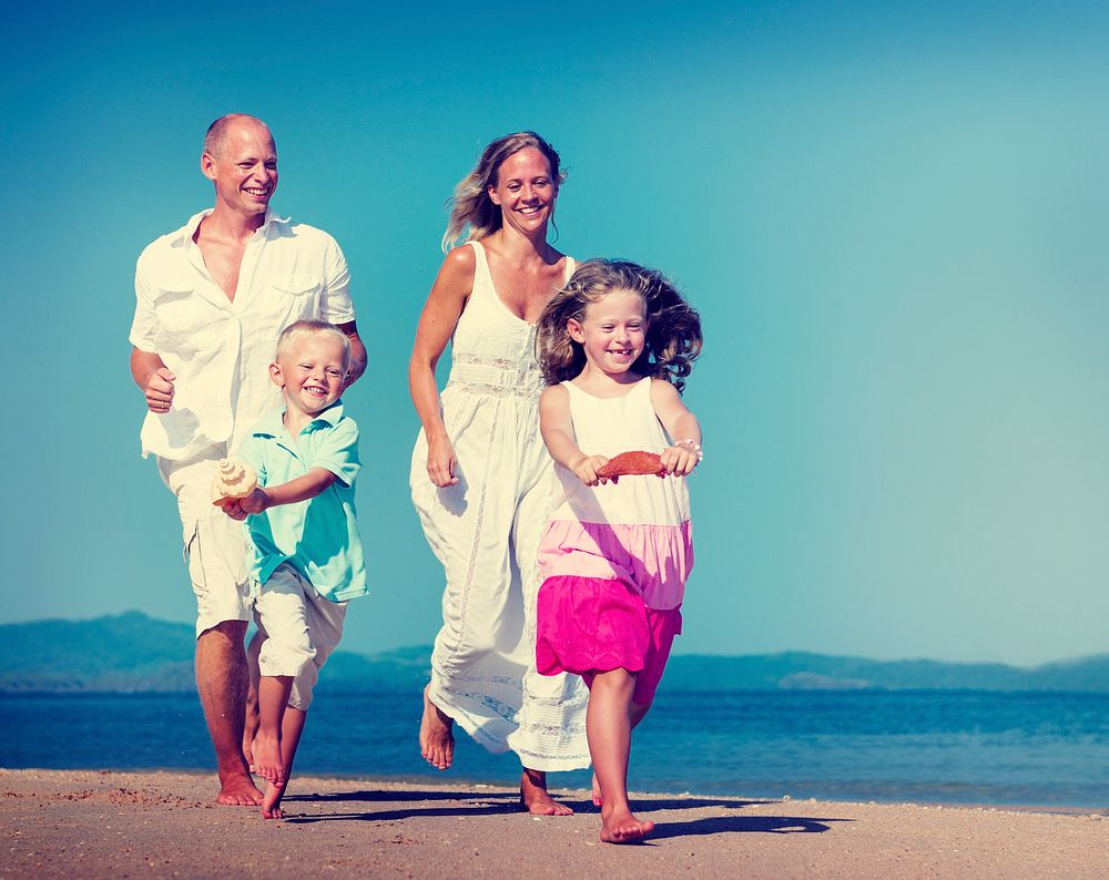 Family Running Playful Vacation Beach Holiday Concept