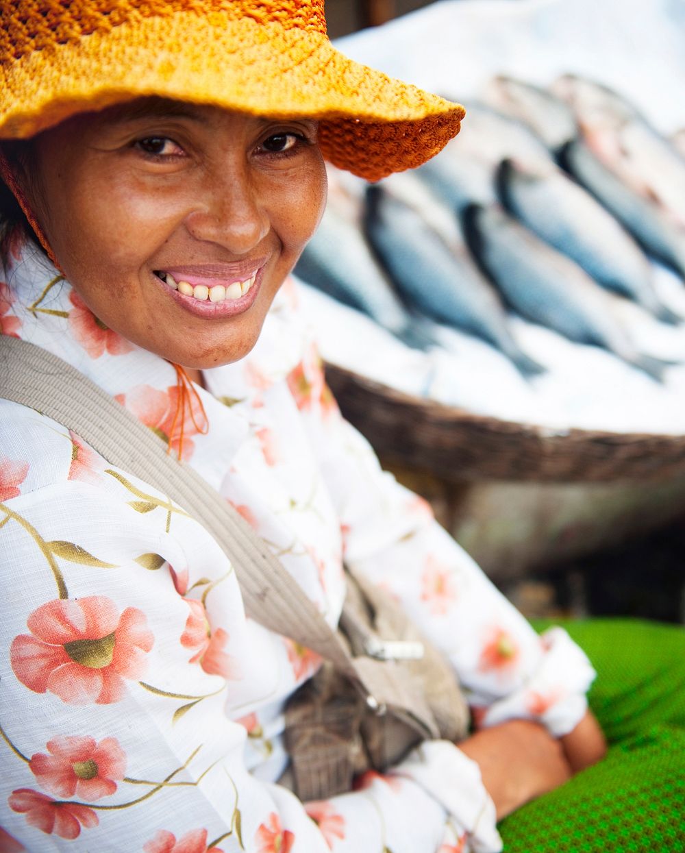 Cambodian woman selling fish at a market