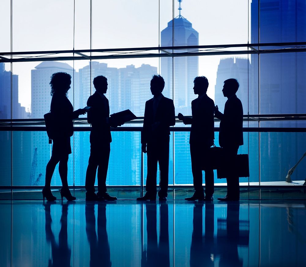 Silhouette of business people in a meeting
