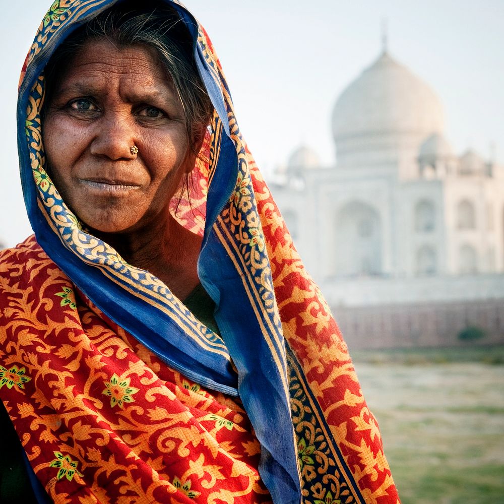 Indian woman in front of the Taj Mahal