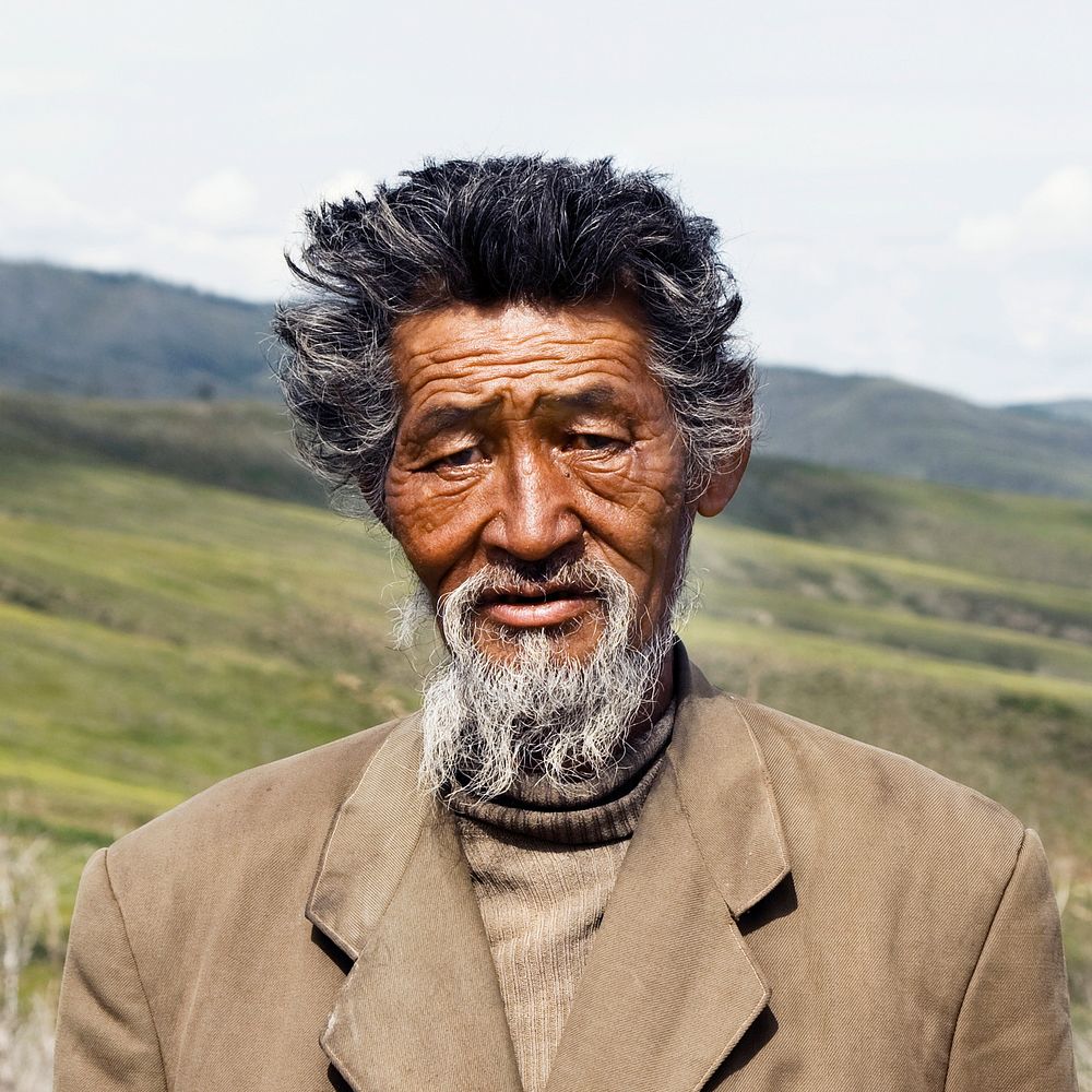 Portrait of Mongolian Man in Field Concept
