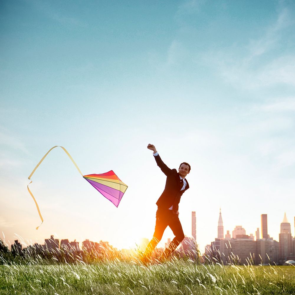 Businessman Playing Kite Lifestyle Relaxation Concept
