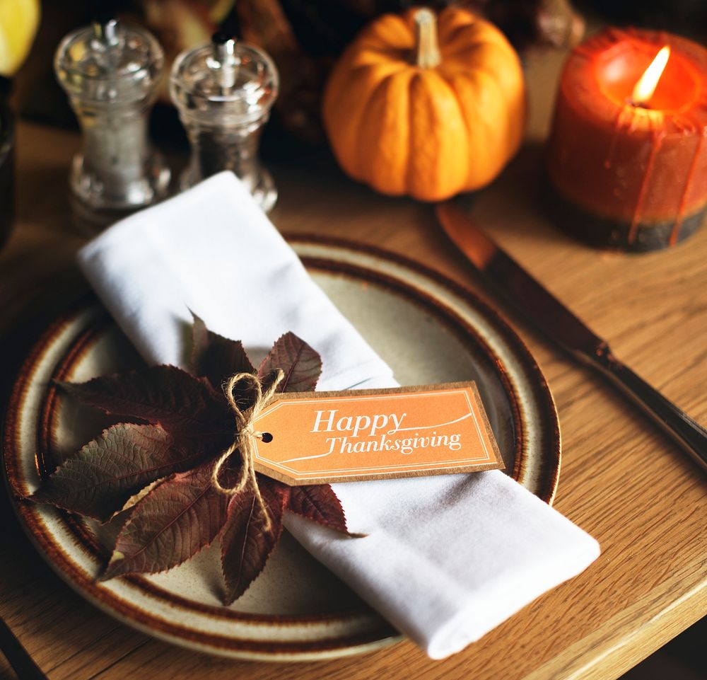 Napkin with a Thanksgiving tag on the table