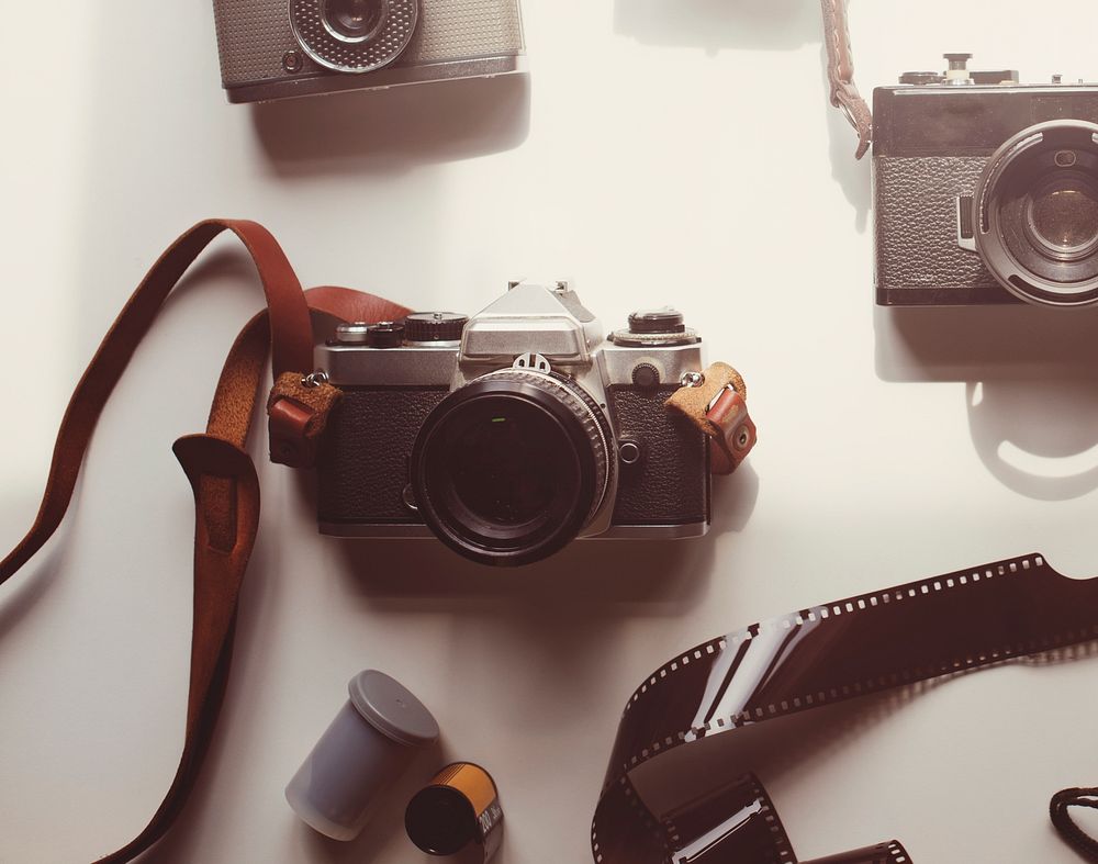 Flat lay of vintage analog cameras