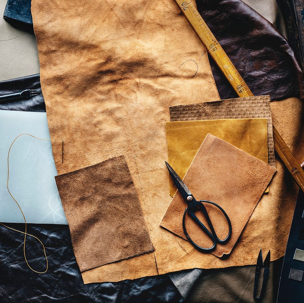 Aerial view of leather crafting with tools