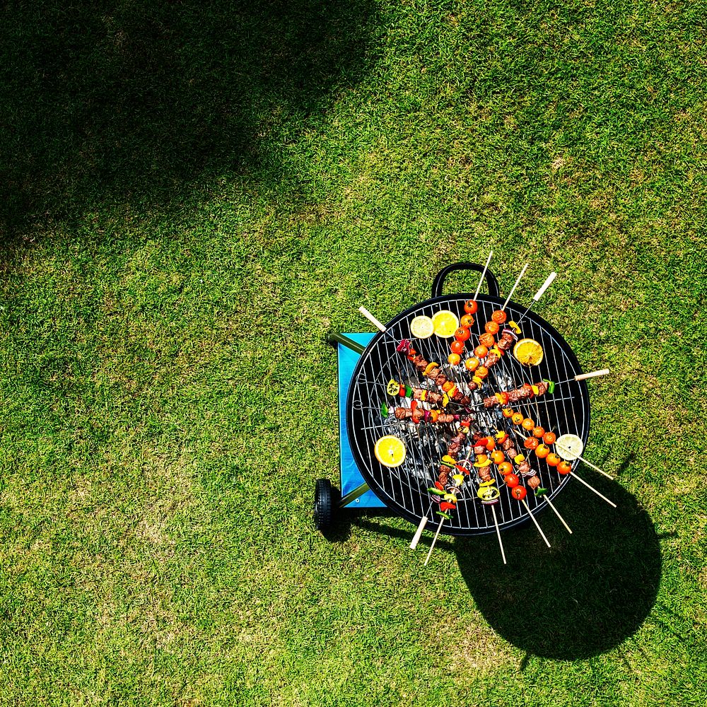 Aerial view of barbecues steaks on the charcoal grill