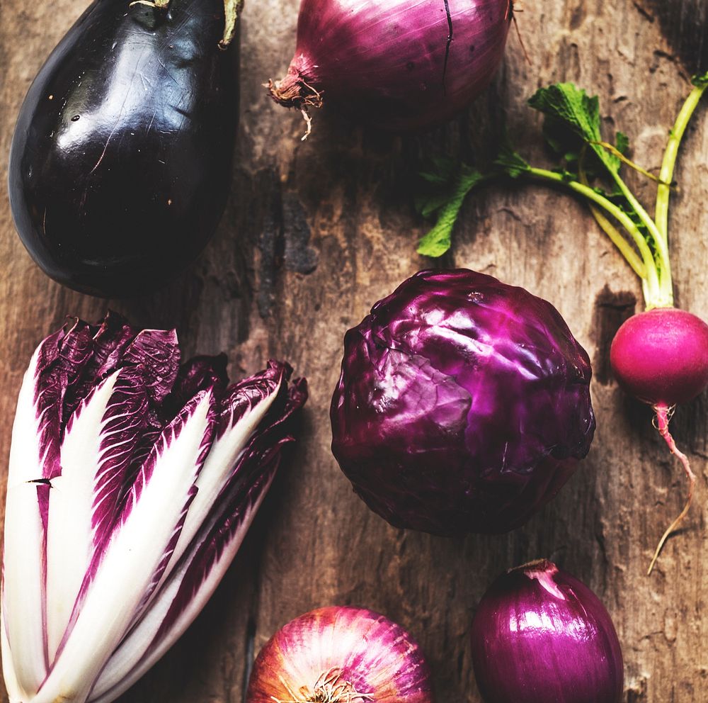 Purple vegetables on a wooden