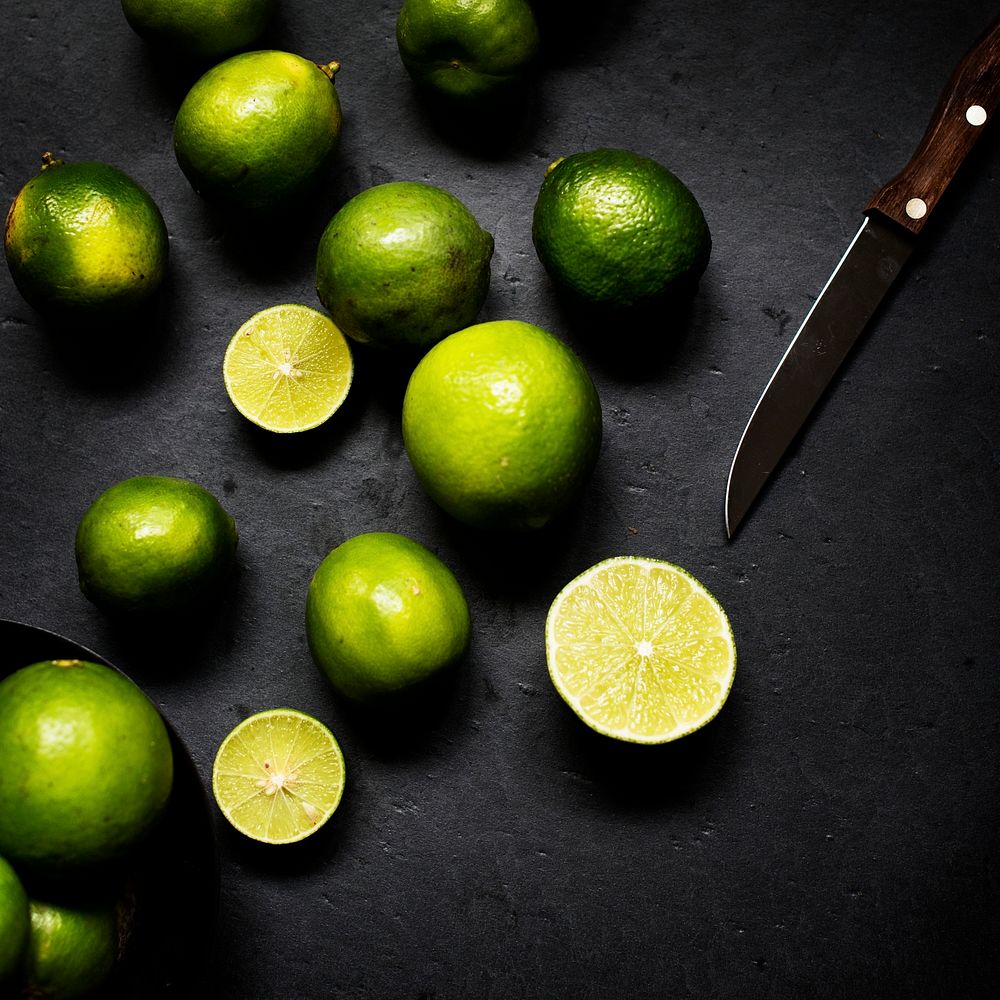 Closeup of fresh lime with knife