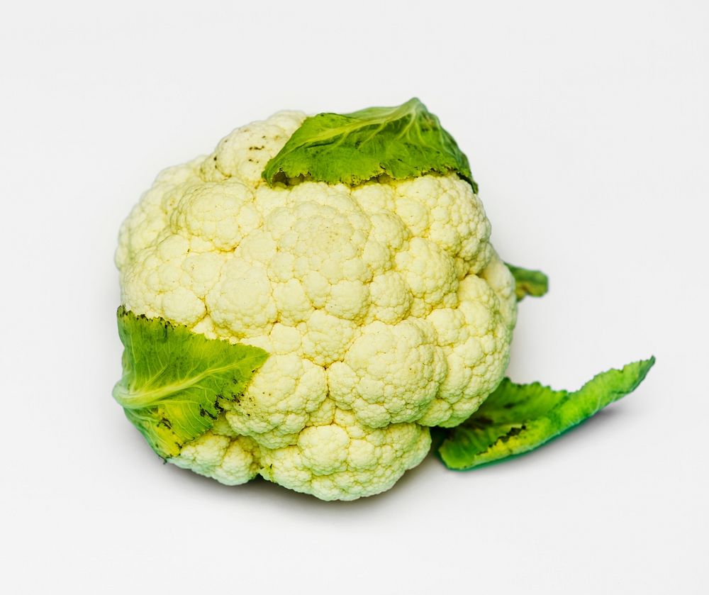 Closeup of fresh cauliflower on white background