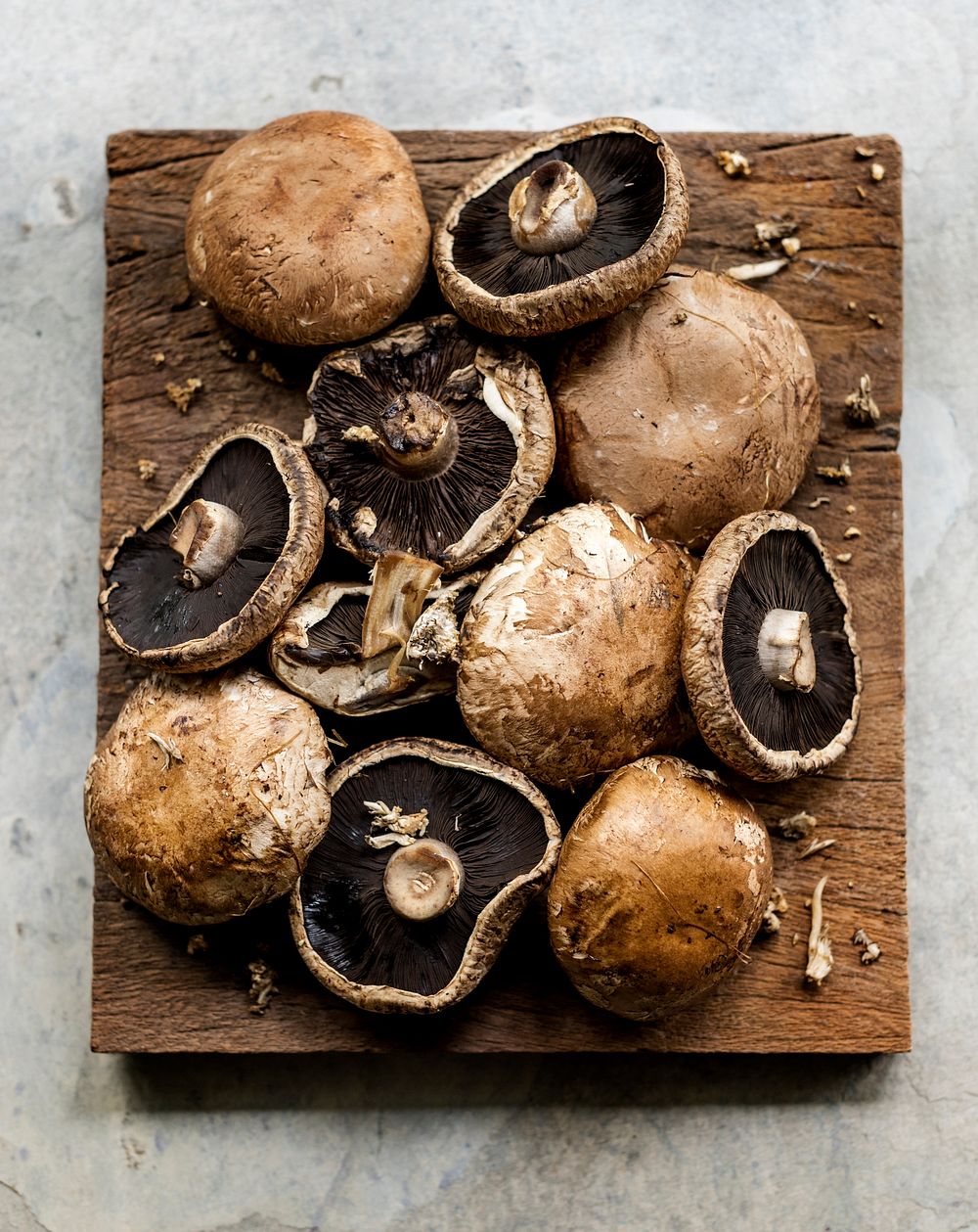 Portobello mushrooms on the wooden board