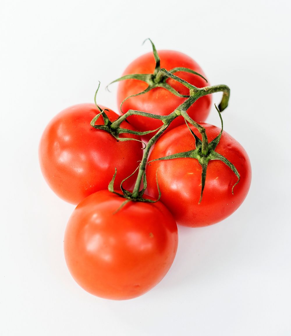 Natural tomatoes isolated on background