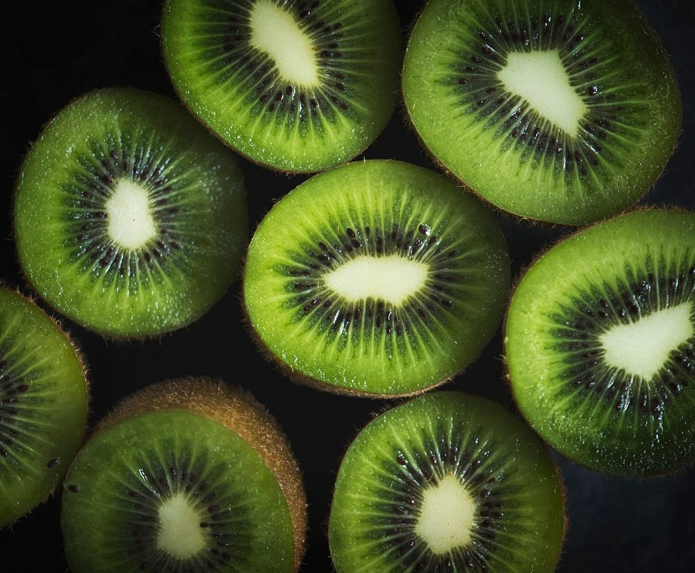 Closeup of fresh cut kiwi background