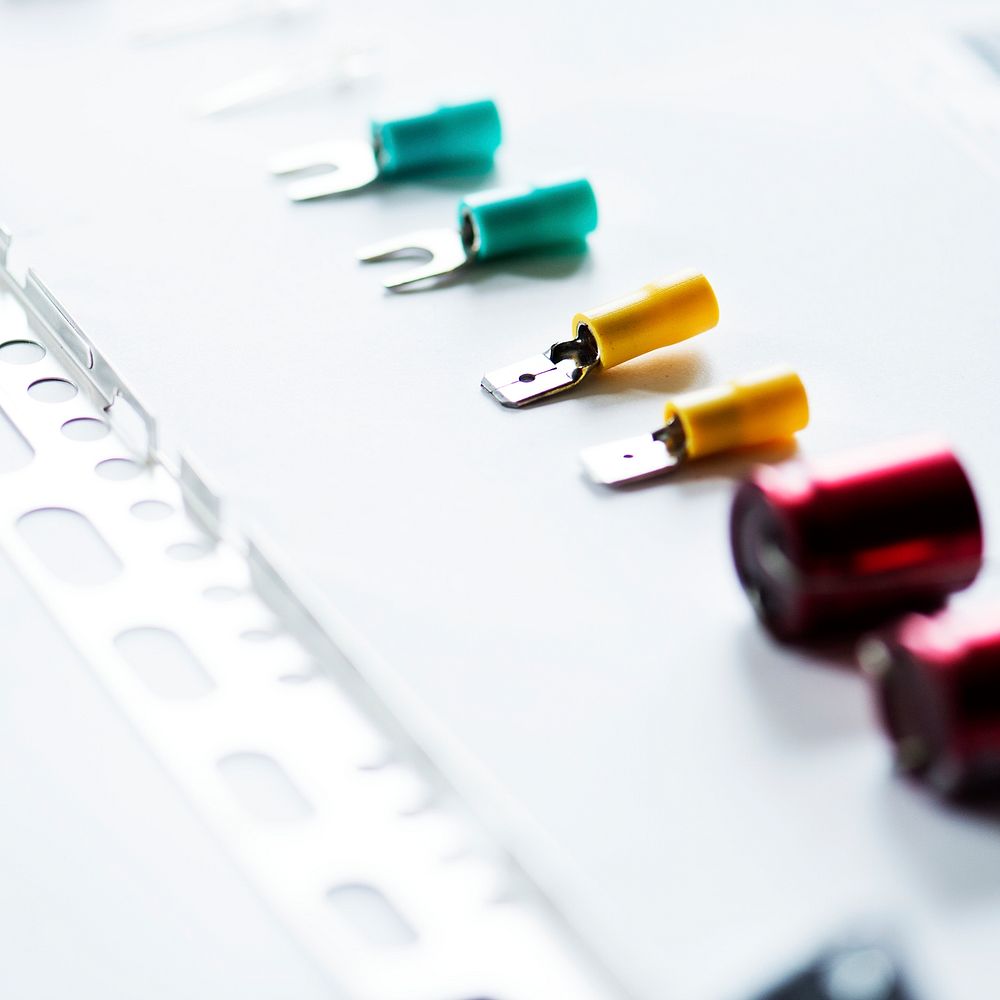 Closeup of various capacitors on white background