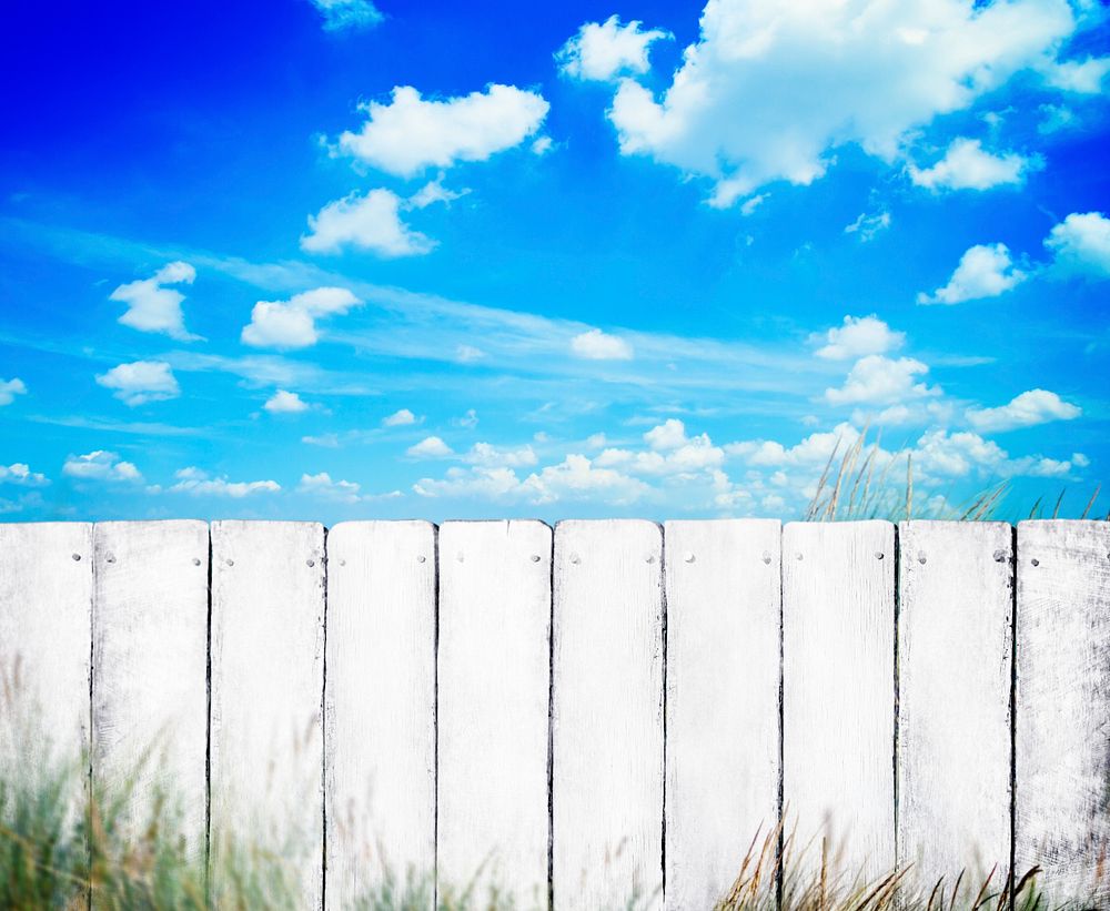 White Fence with Blue Sky