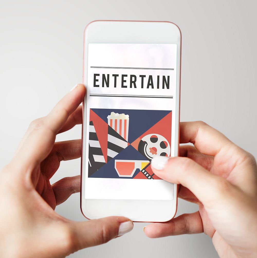 Hands holding mobile phone of movies theatre media entertainment