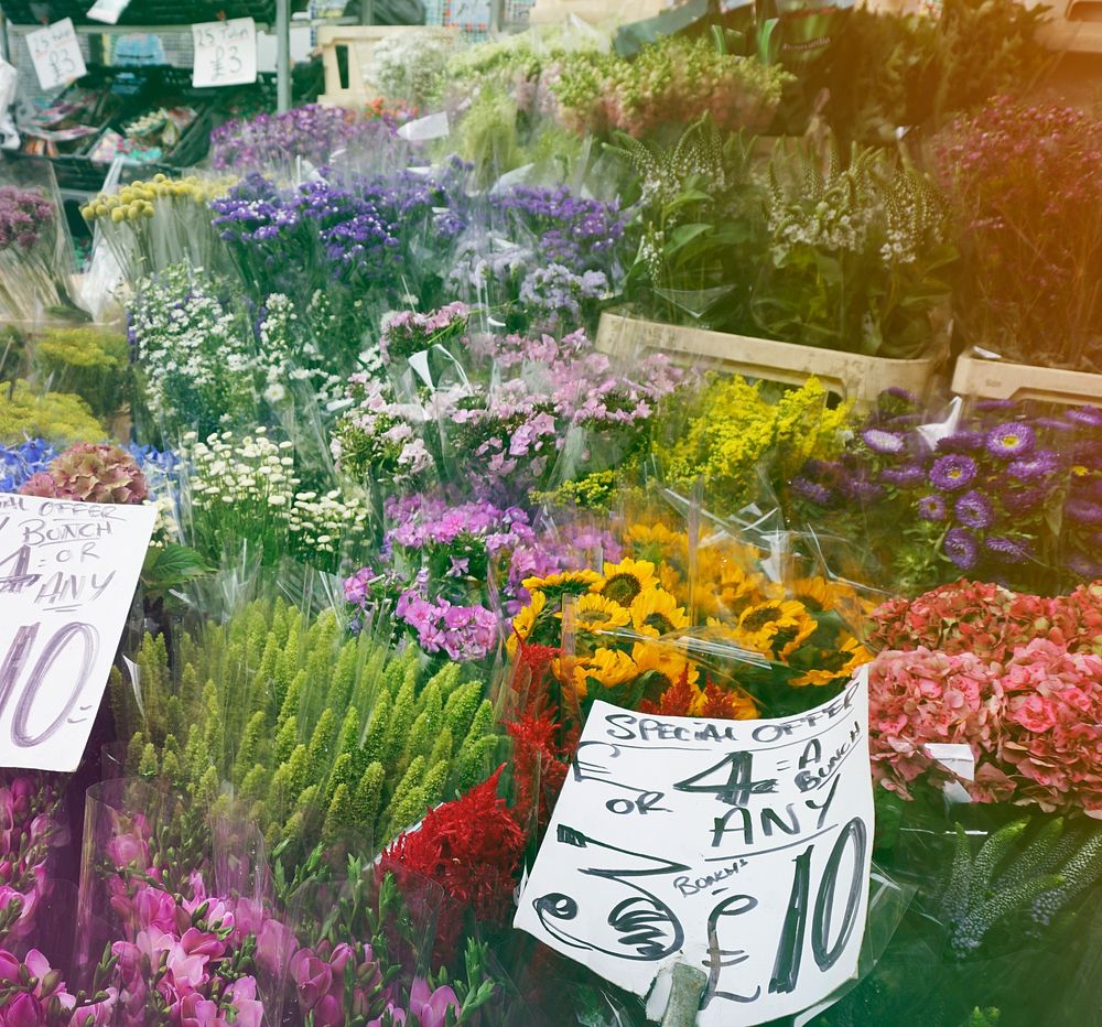 Flower shop full bloom at marketplace