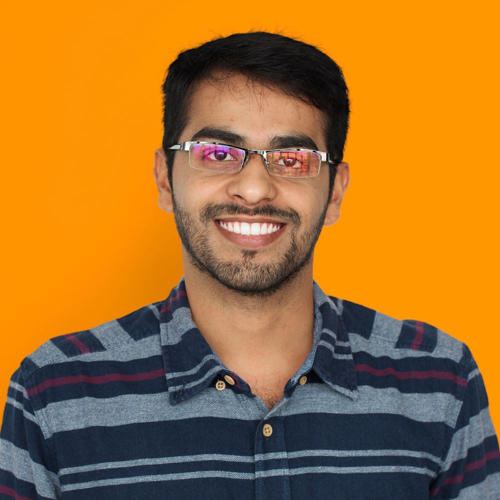 Indian Man Smiling Studio Concept