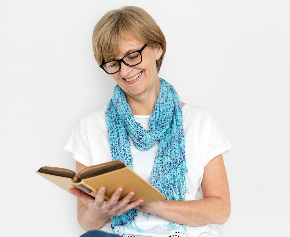 Mature Caucasian Woman Smiling Holding Notebook