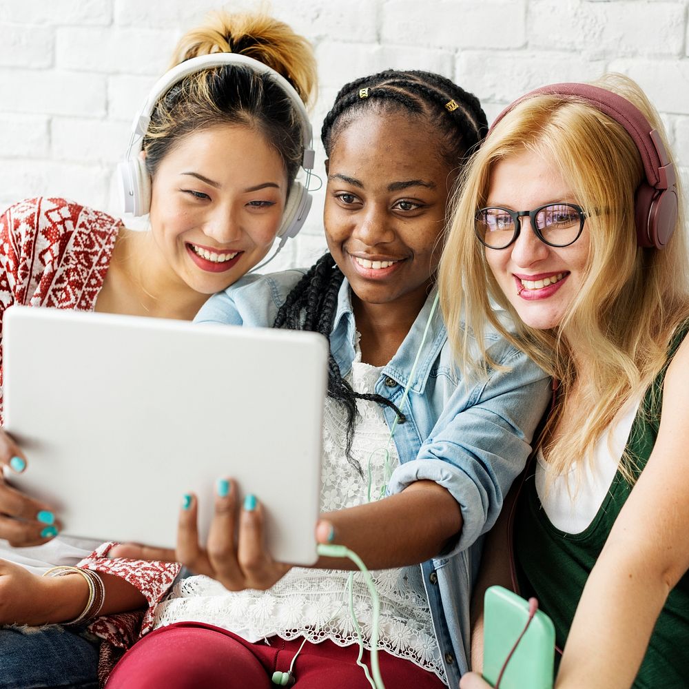 Diversity Friends Women Using Digital Tablet Concept