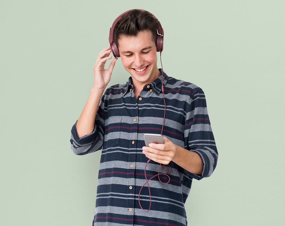 Young man casual listening to music