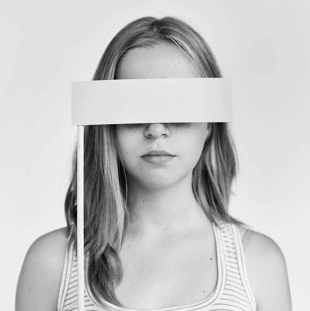 Young Woman Covering Eyes Concept