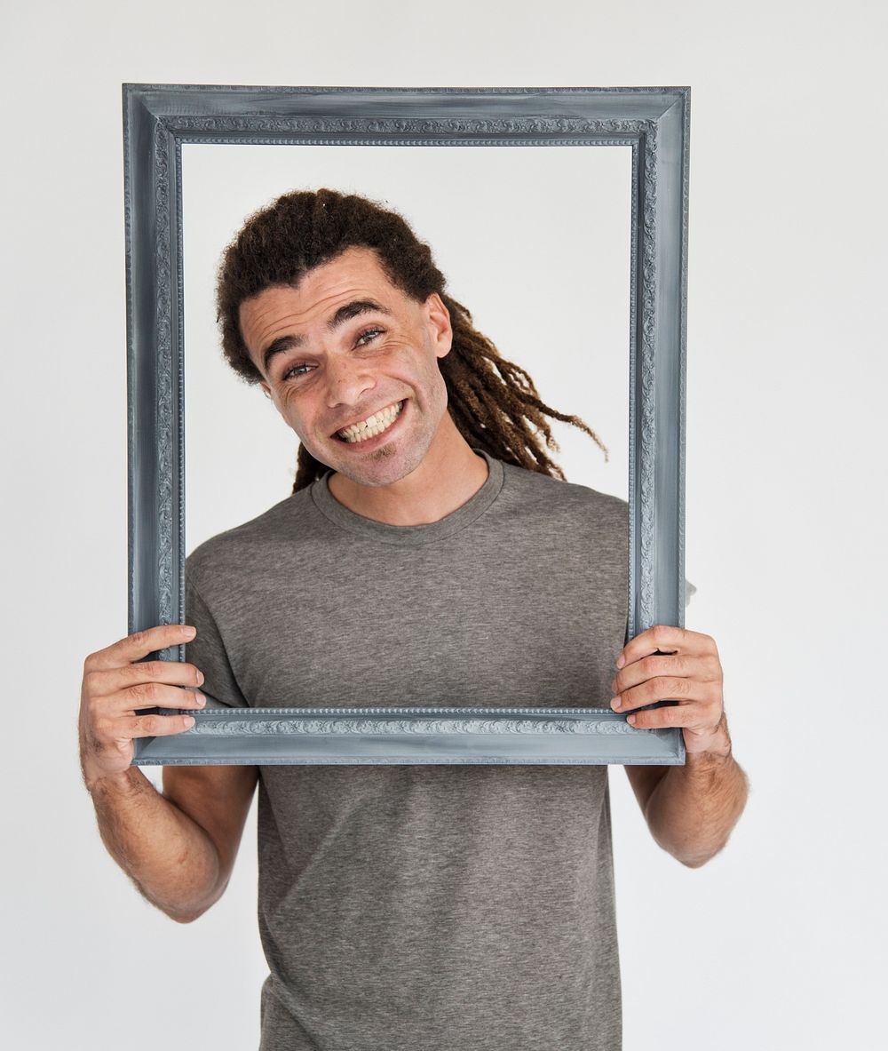 Hipster Man Smiling Holding Frame Concept