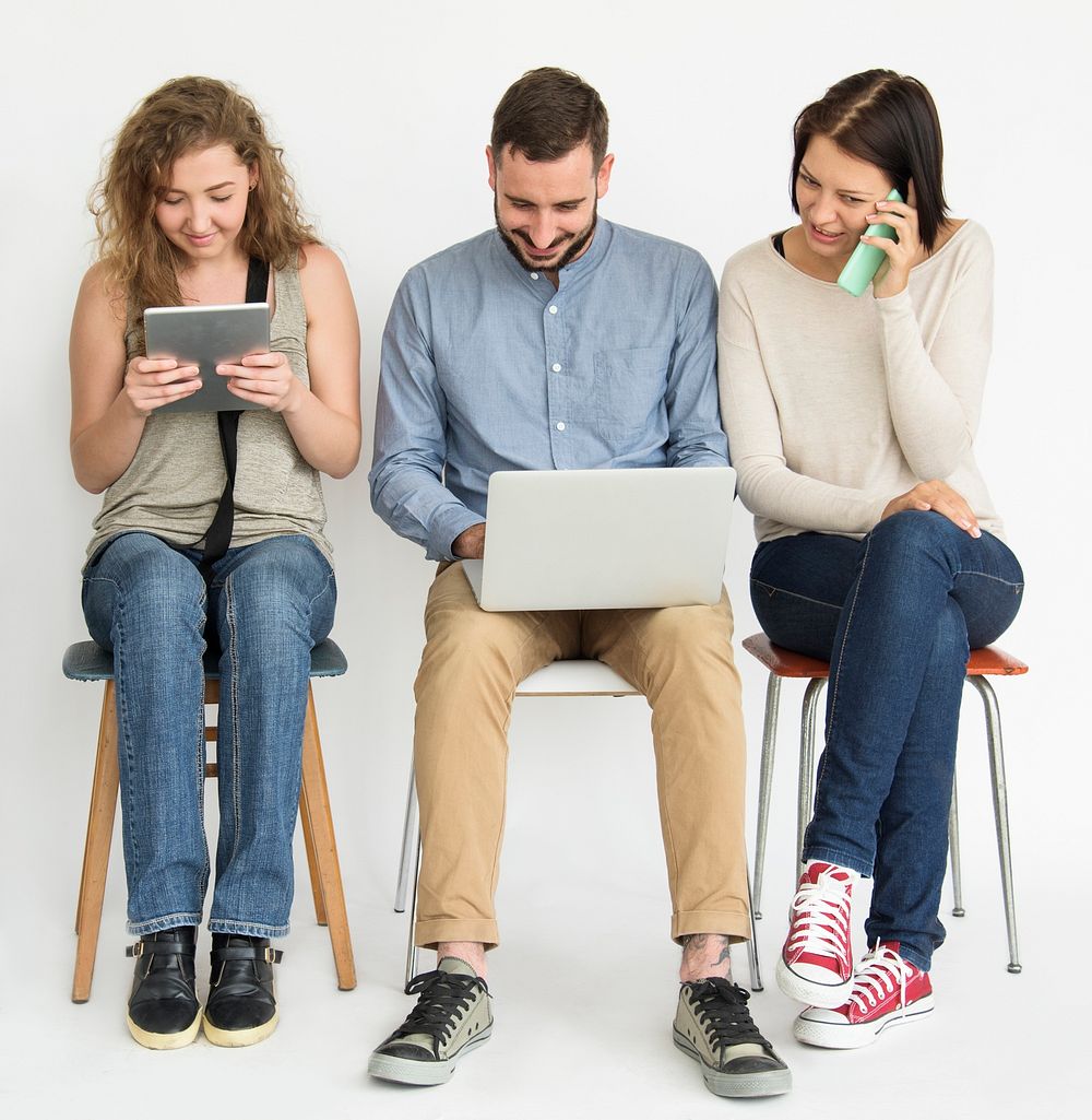 Group of people using digital devices
