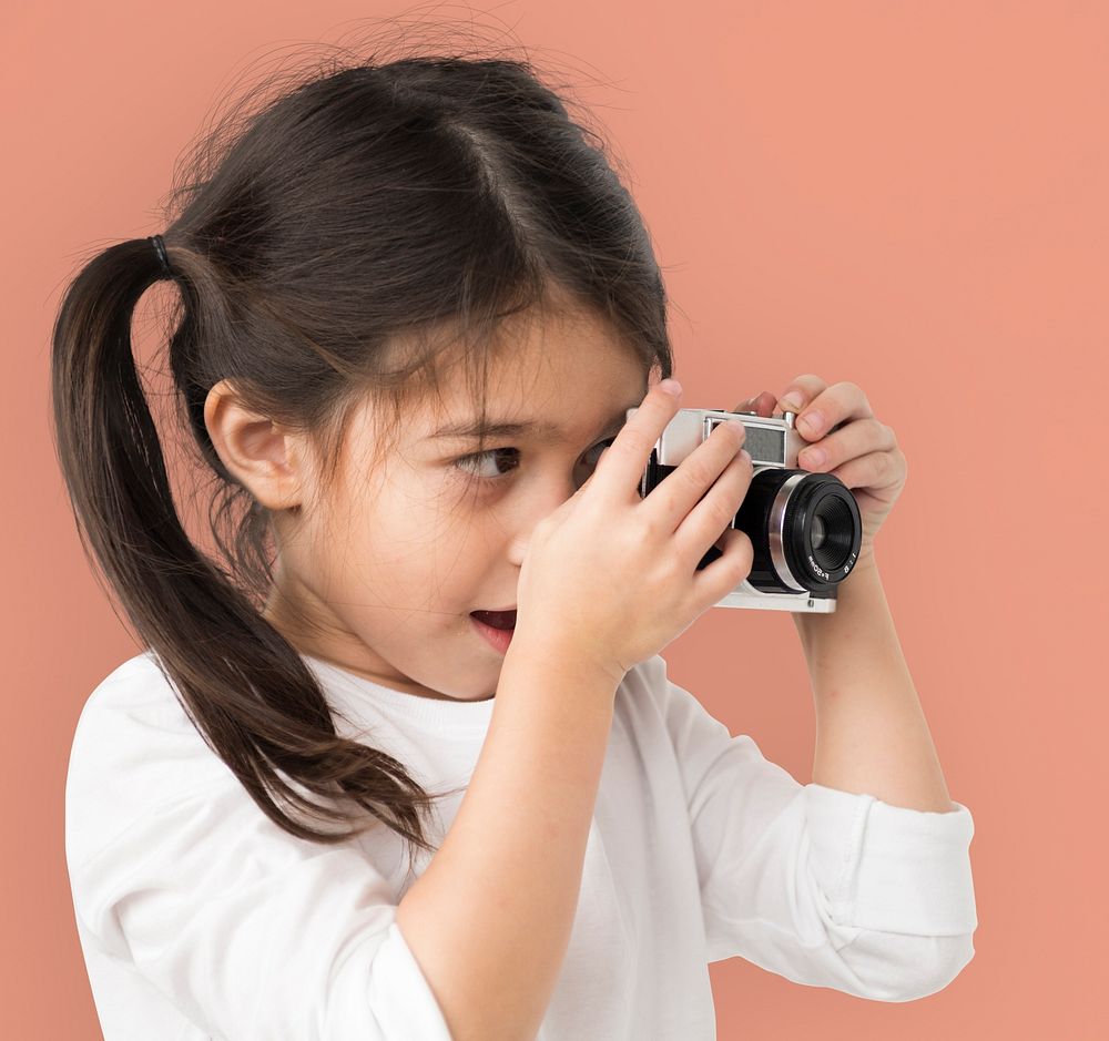 Little Girl Hands Hold Camera Shooting