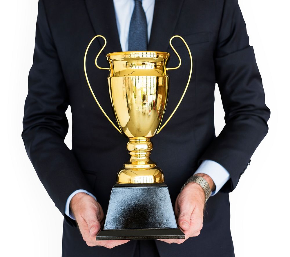 Business Man Holding Trophy Award