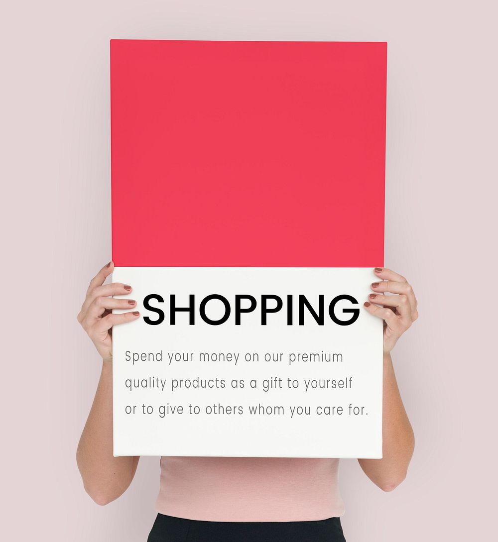 Woman holding a placard with a text shopping