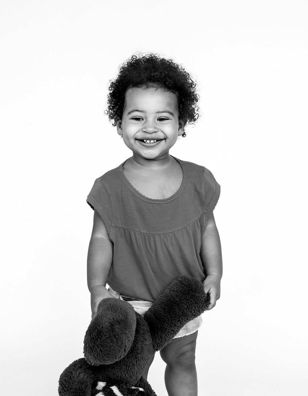 Little Girl Holding Play Bear Concept