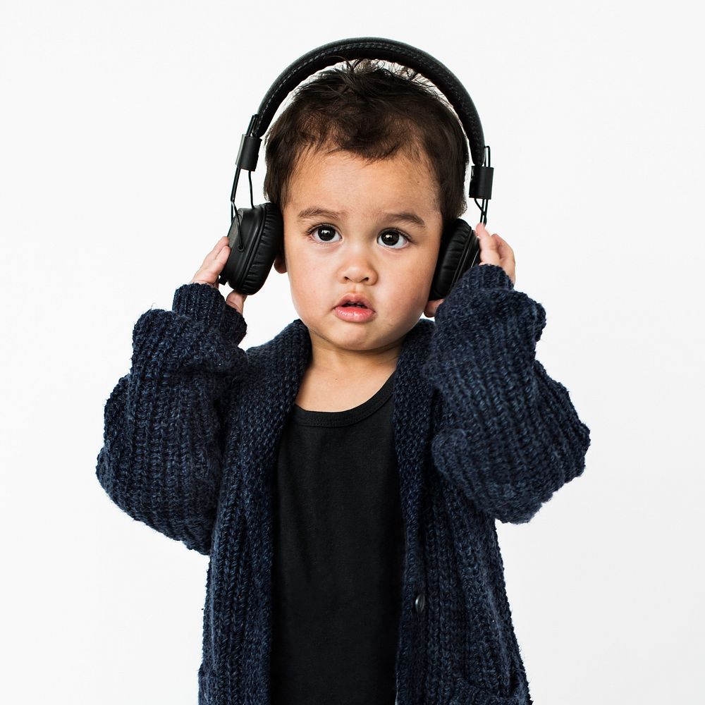 Little Boy Headphone Listening Music Concept
