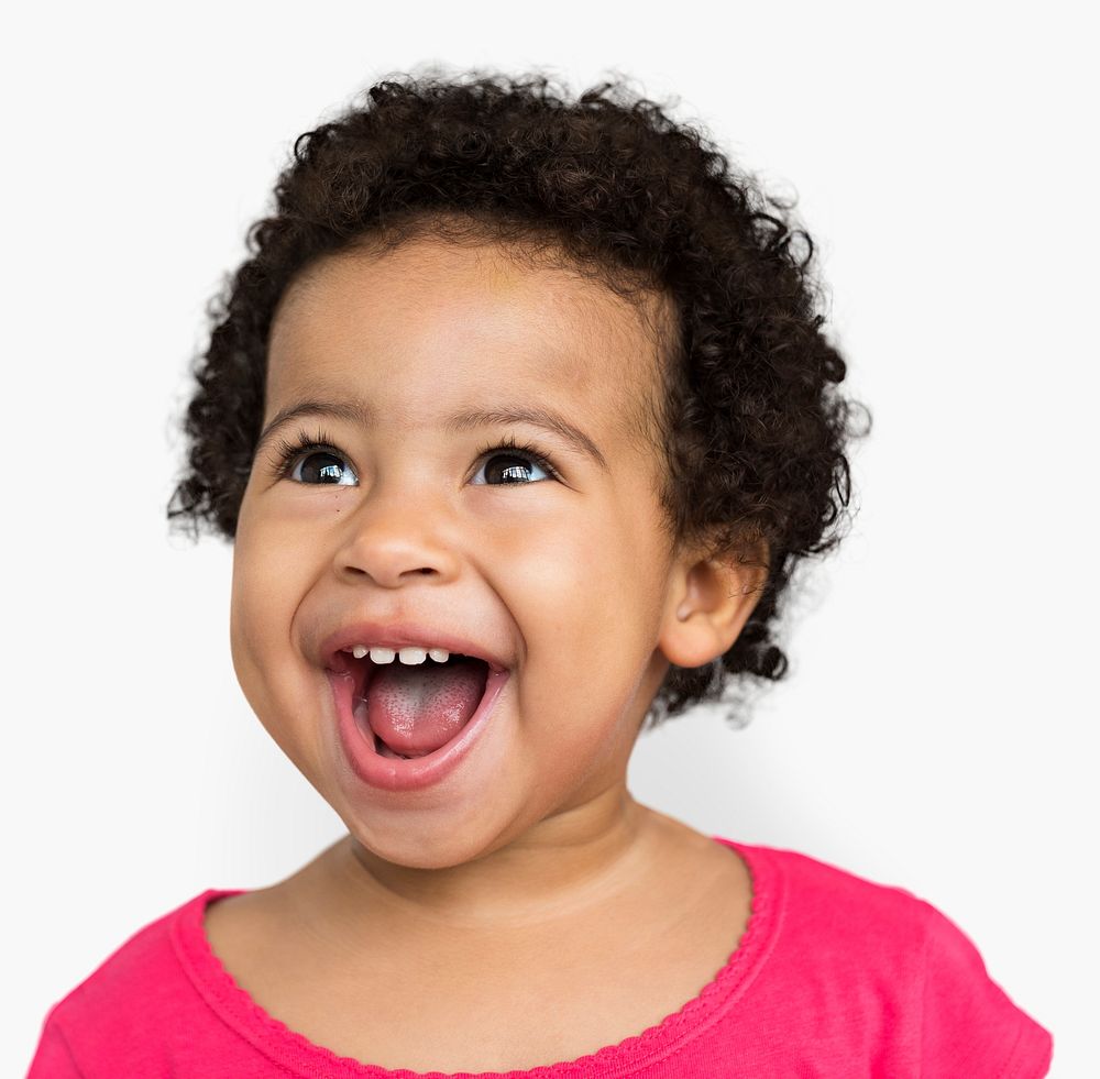 Studio portrait of a little girl smiling