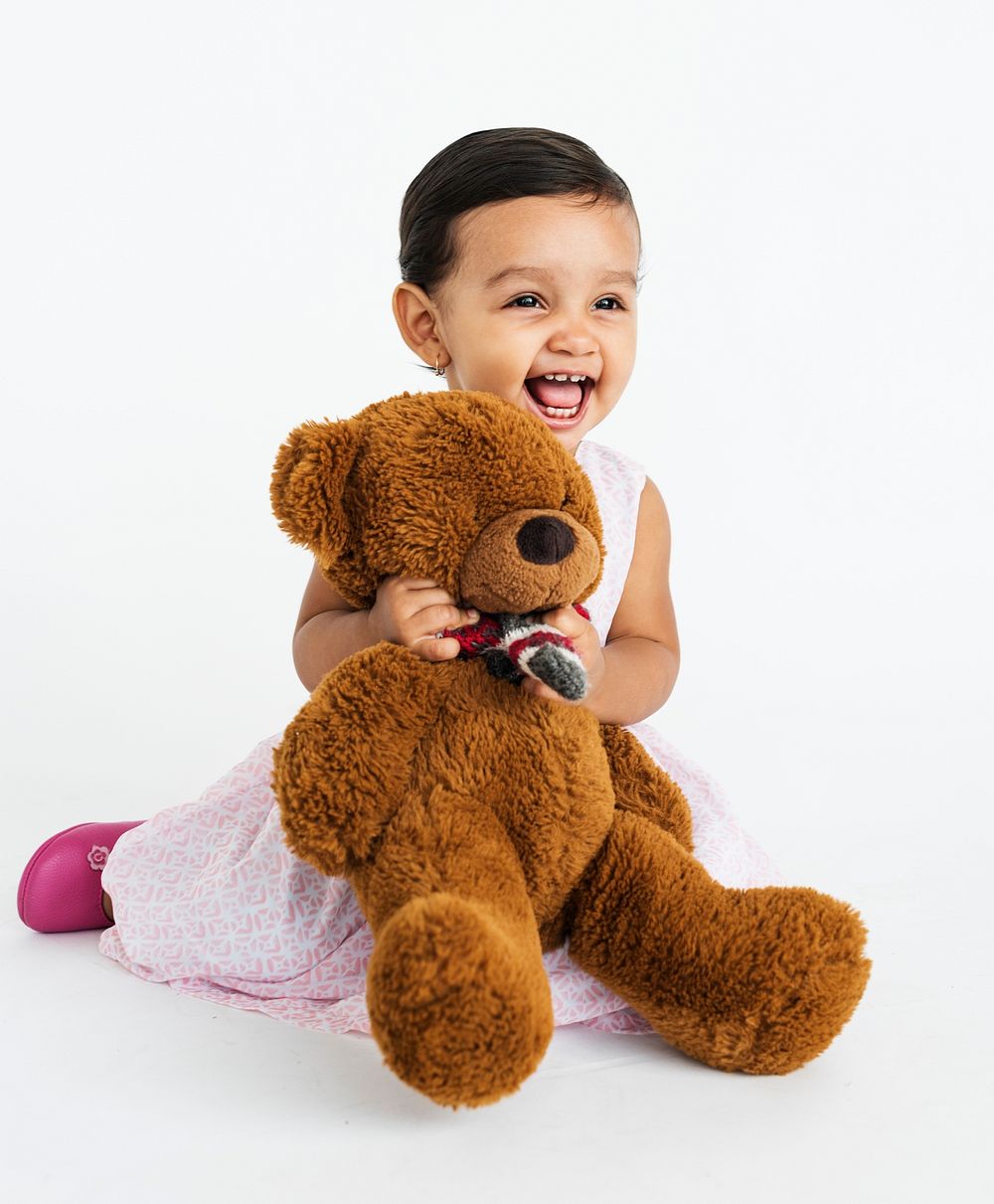 Little Girl Smiling Happiness Playful Teddy Bear Portrait Concept