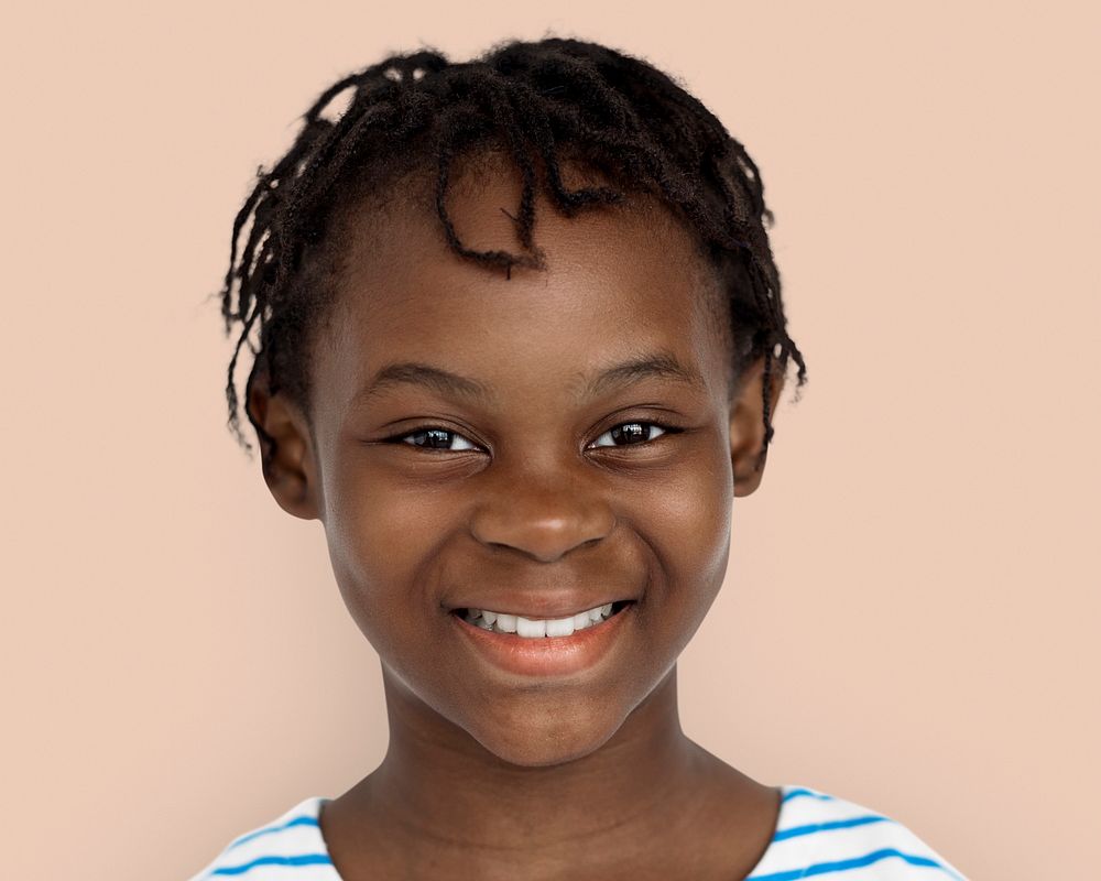 Happy little African girl, smiling face portrait psd