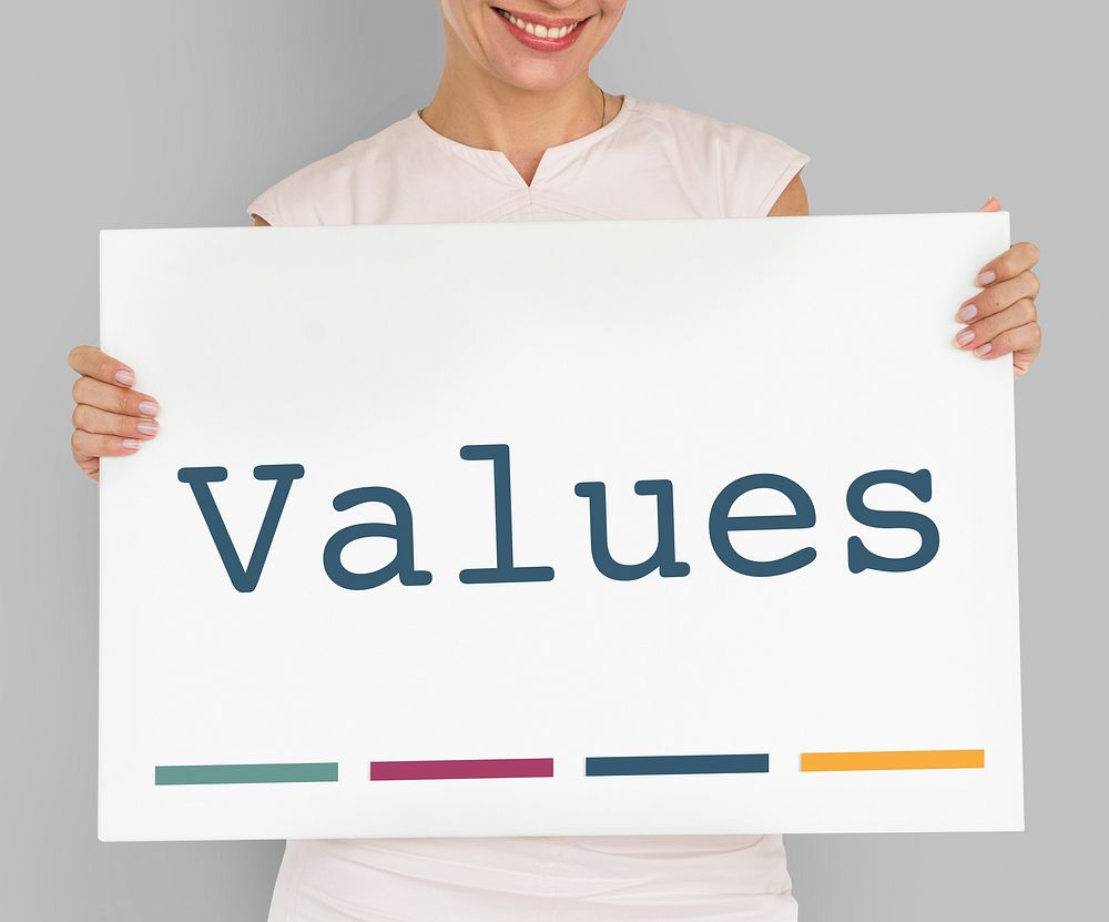 Woman holding a board with Values
