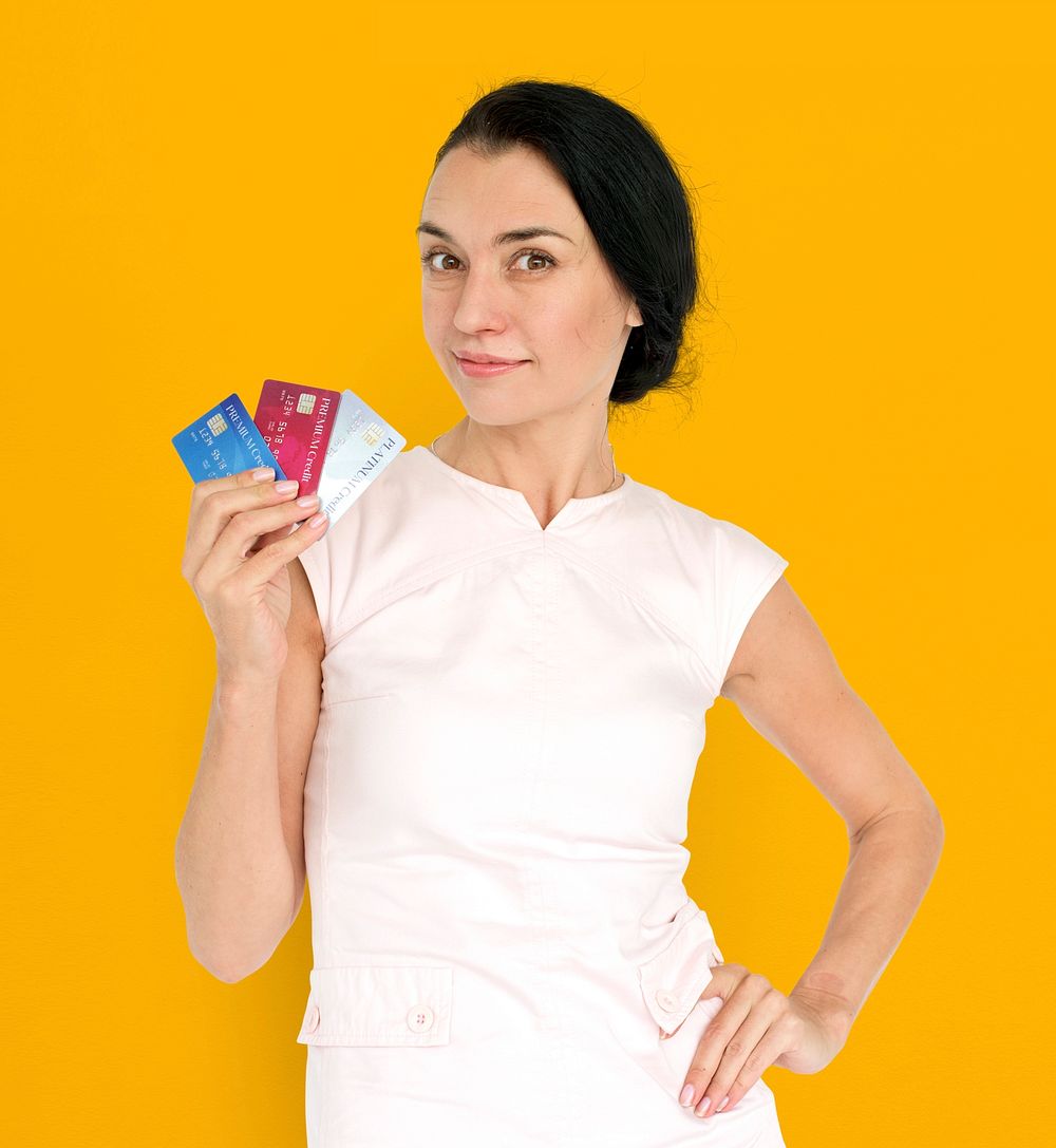 Eurasian Lady Holding Credit Cards Concept