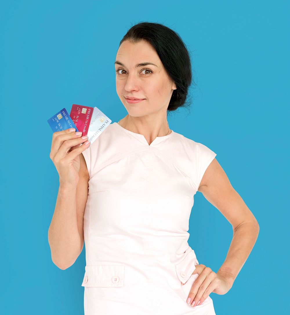 Eurasian Lady Holding Credit Cards Concept