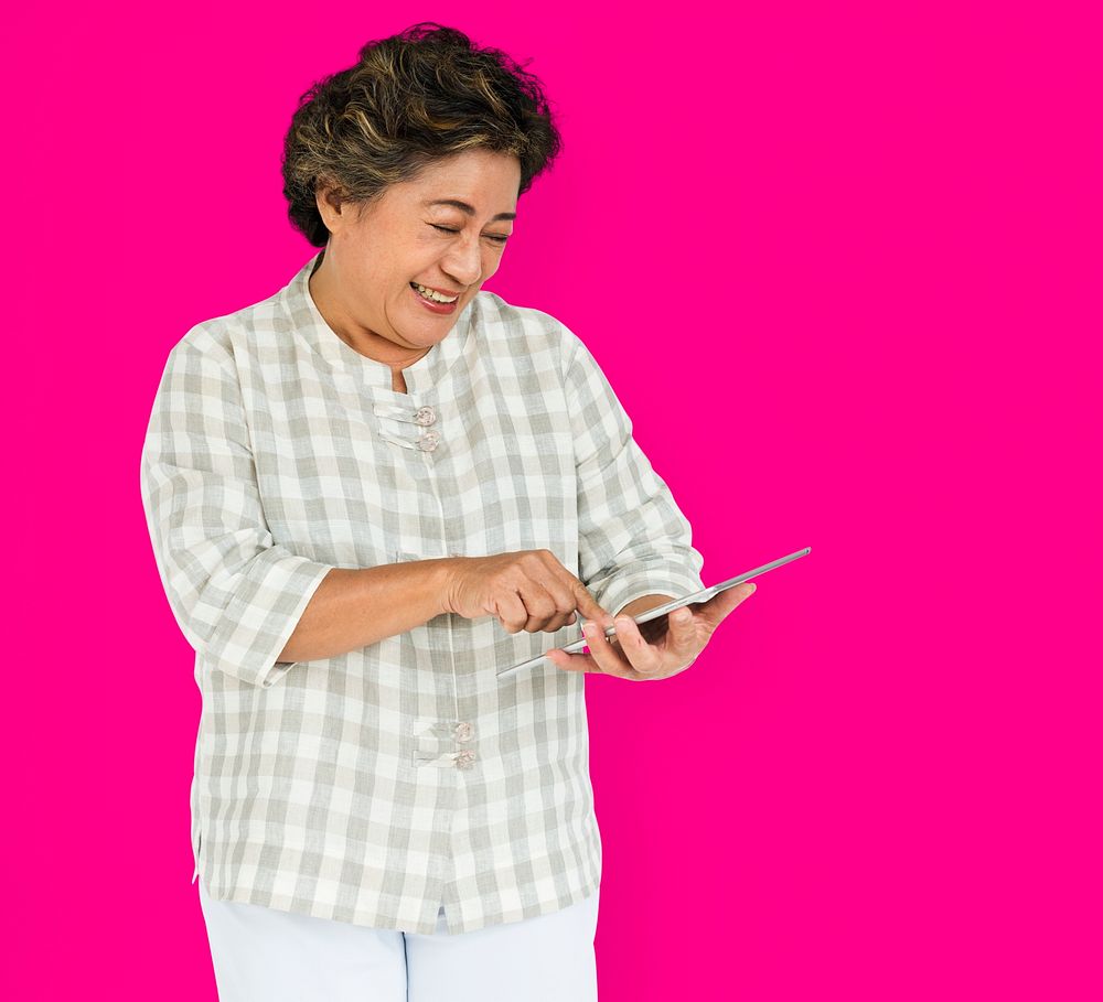 Mature Woman Holding Tablet Concept