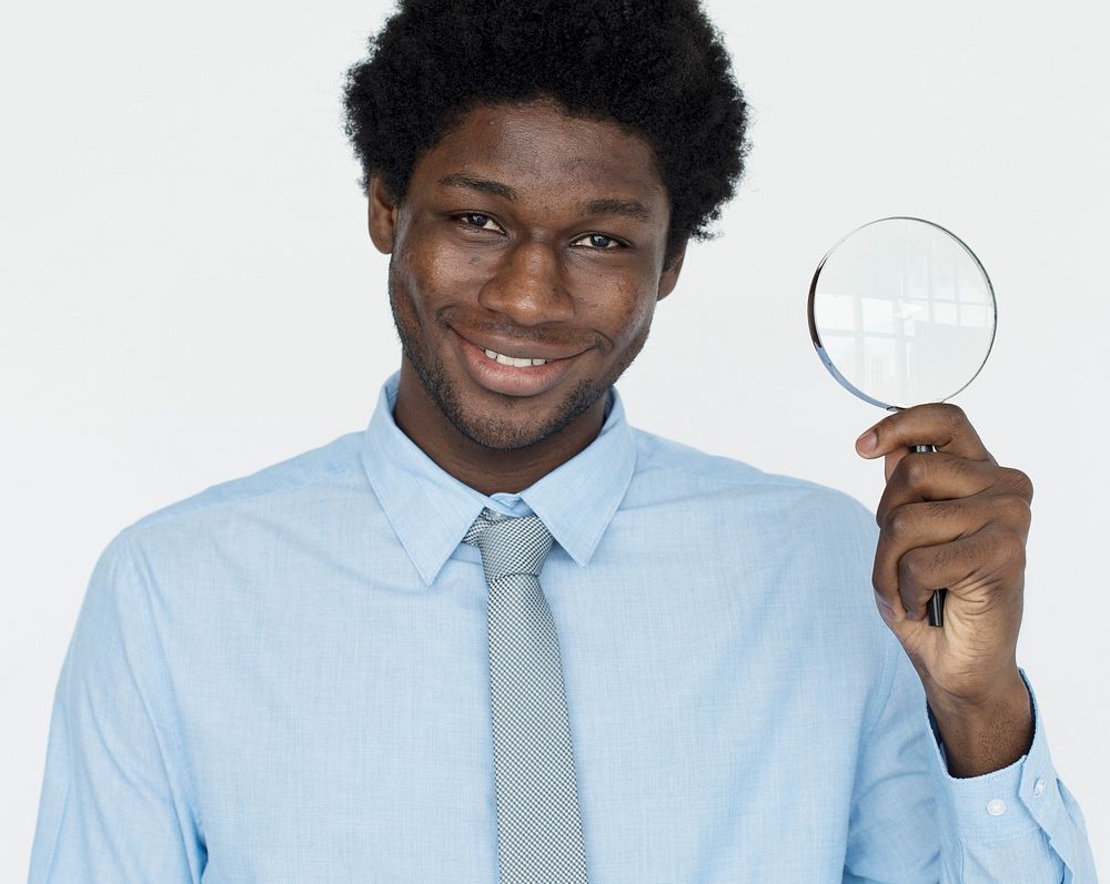 Businessman Holding Magnifying Glass Searching Vision Concept